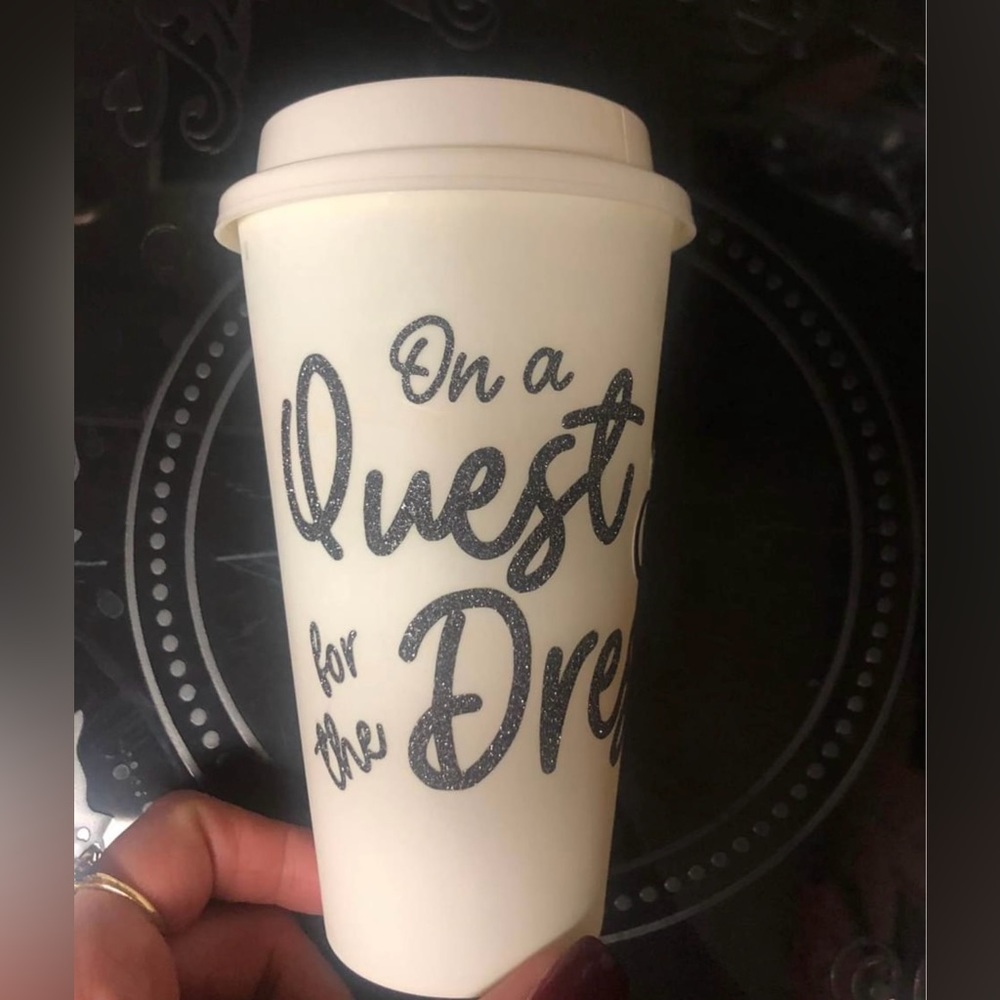 Plastic reusable cup with lid for those going dress shopping.